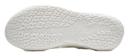 Sole of pure white basketball shoes with textured traction pattern