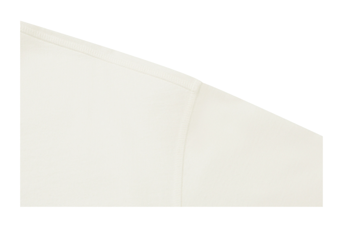 Ivory long-sleeve T-shirt sleeve and side panel stitching