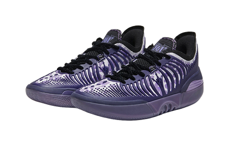 Pair of purple low basketball shoes with black laces and ribbed side stripes