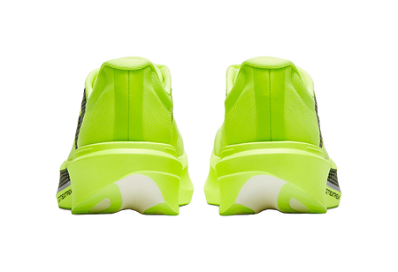 Neon yellow back view of low-top running shoes with heel tabs and cushioned sole