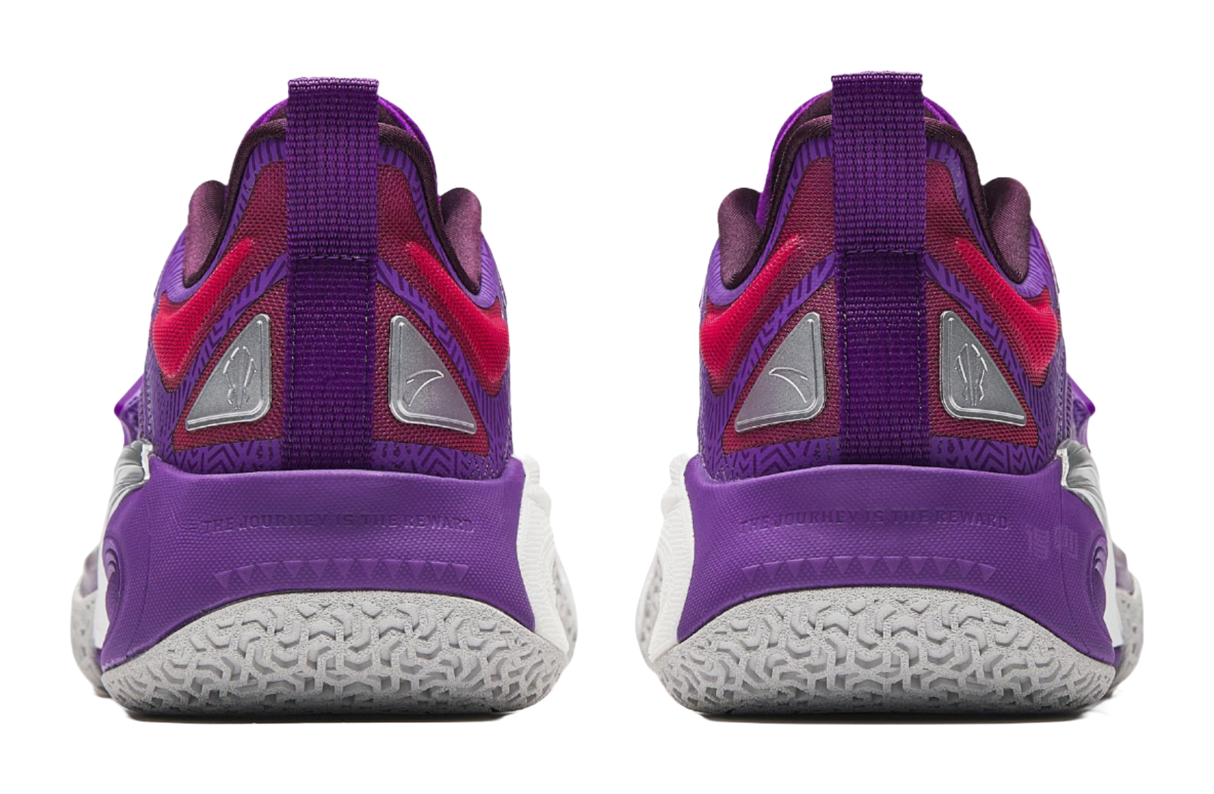 Purple basketball shoes with red heel panels, gray sole tread, and back pull tabs.