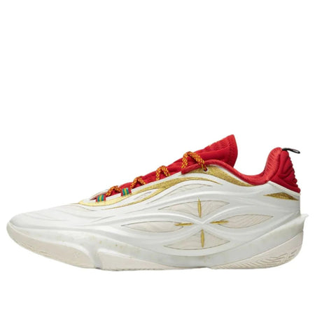 Basketball shoe with white midsole, red upper, gold design, and colorful braided laces