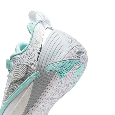 White and light blue-gray basketball shoe with teal accents, patterned sole and heel