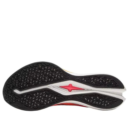 Running shoe outsole with black tread and red star on light gray midfoot