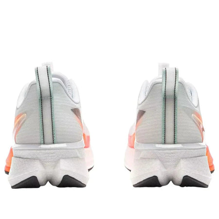 Pair of white running shoes with orange heel accent and light blue heel stripe