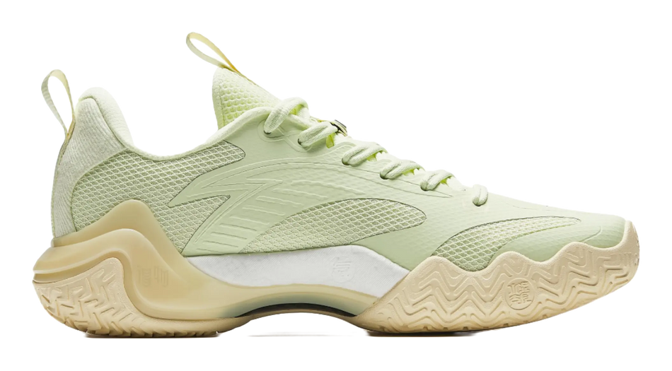 Light green basketball shoe side view with textured upper and cushioned outsole