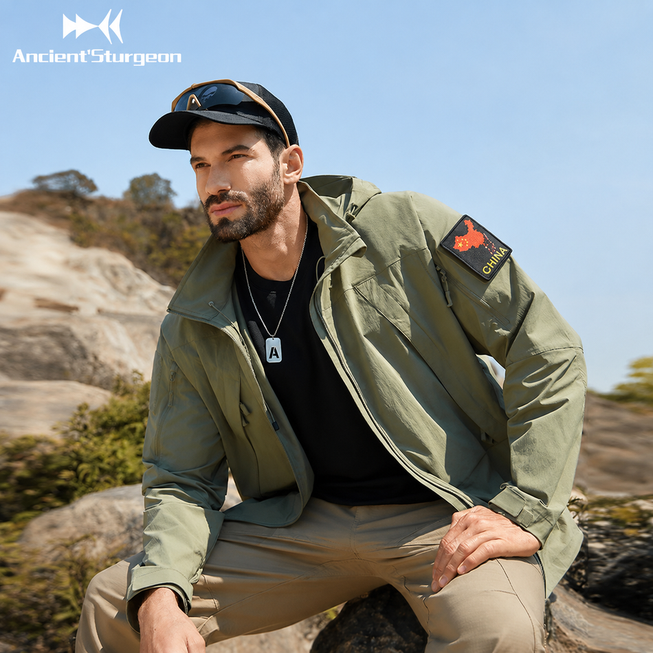 Mist green hooded jacket with front zip and branded sleeve patch