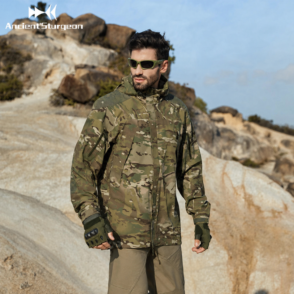 Hard shell camouflage jacket, front view with full zip and hood, olive-brown pattern