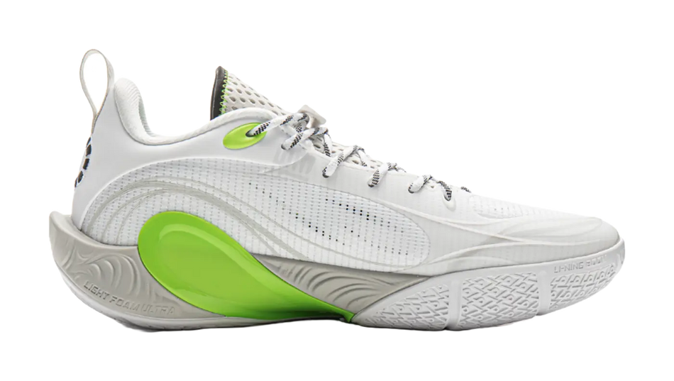 Men's basketball shoes, white knit upper with neon green heel and black logo.