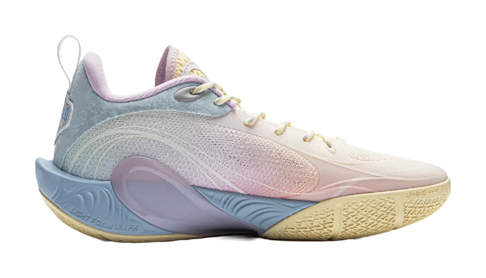 Low-top basketball shoes in pale pink, white, and light blue; side profile view.