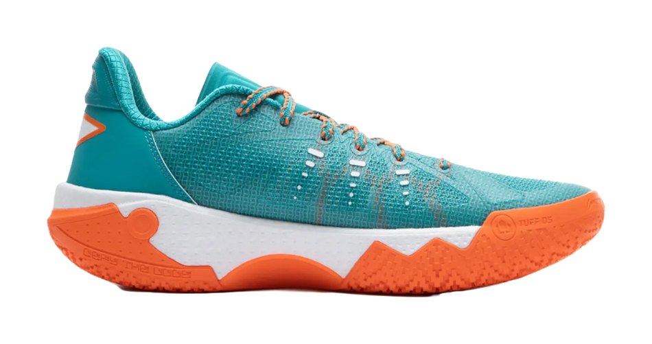 Teal low-top basketball shoe side view with orange outsole and white midsole.