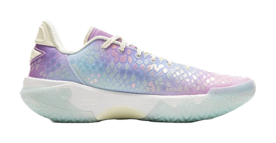 Light blue and purple low-top basketball shoe with textured upper and white laces