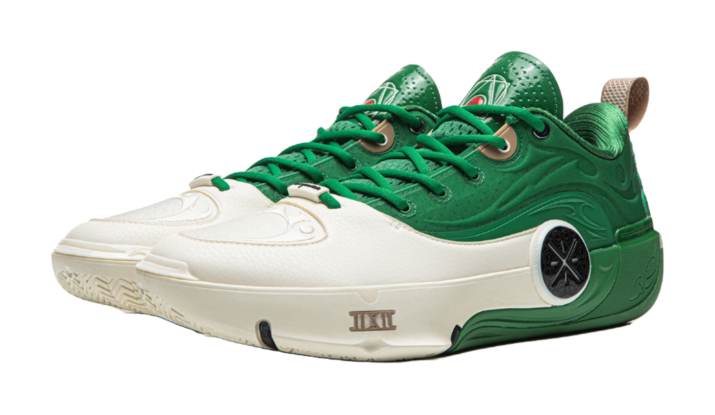 White and green basketball shoes with green laces, side view, textured upper