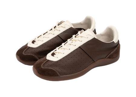 Pair of brown sneakers with antique white laces, perforated sides, and padded collars.