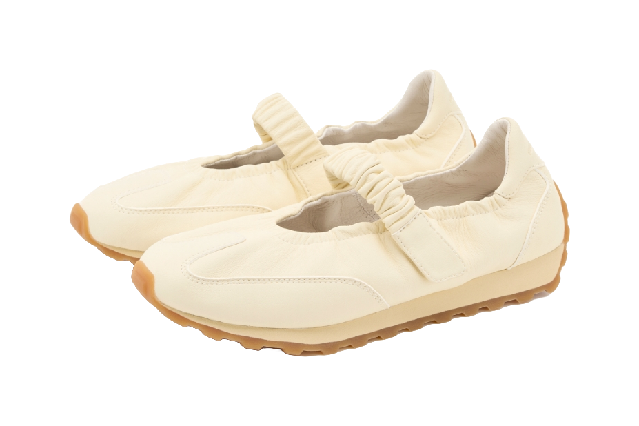 Light yellow Mary Jane low-top shoes, side and front view with padded strap