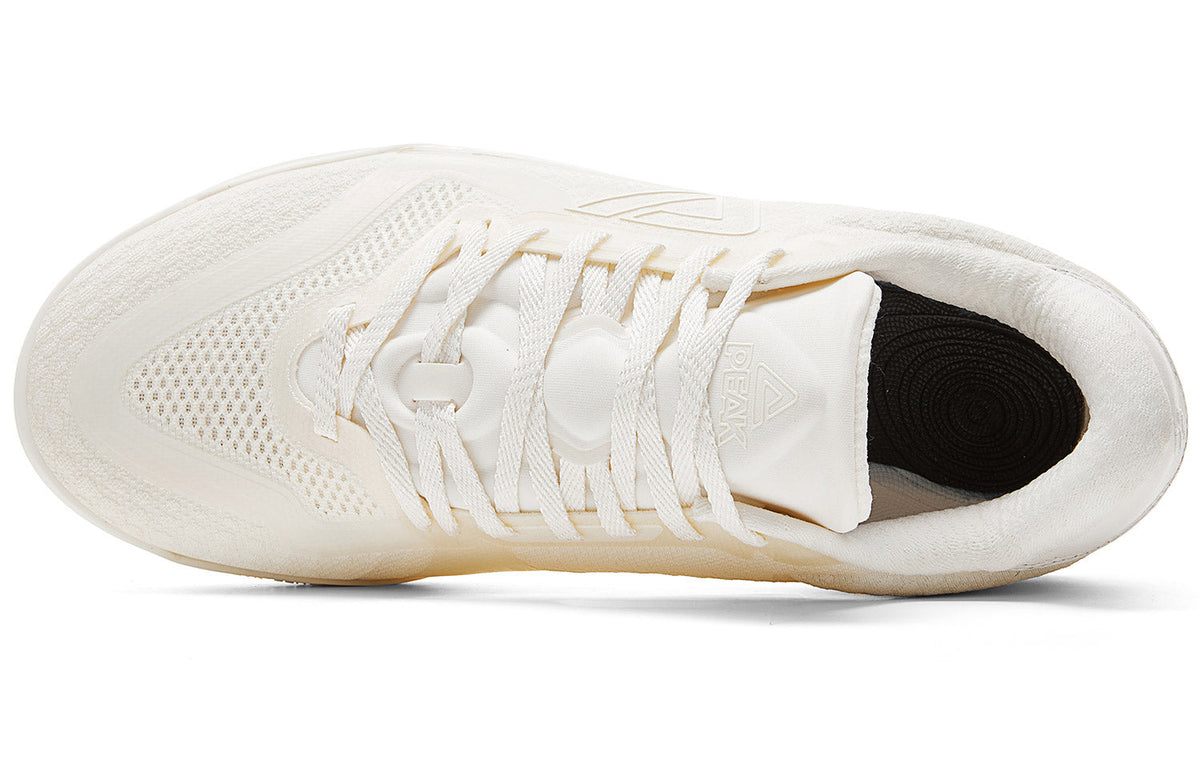 Milky white low-top basketball shoe heel and sock opening detail with lace-up