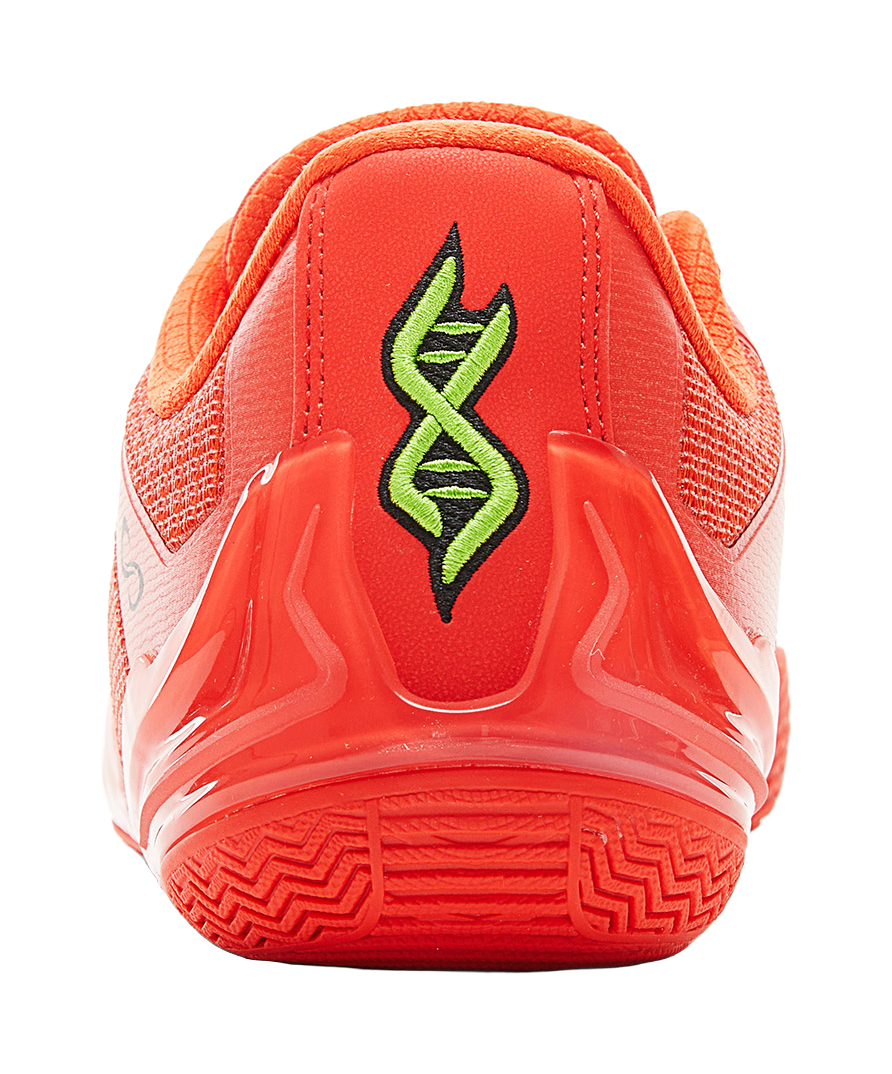 Orange-red basketball shoe heel, with green symbol graphic on back panel.
