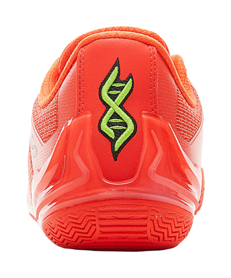 Orange-red basketball shoe heel, with green symbol graphic on back panel.