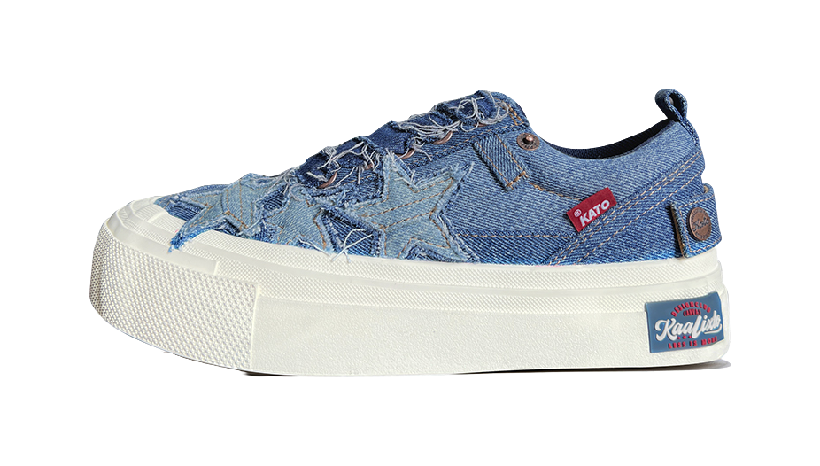 Blue denim low-top canvas sneakers with star stitching and lace-up, thick white sole