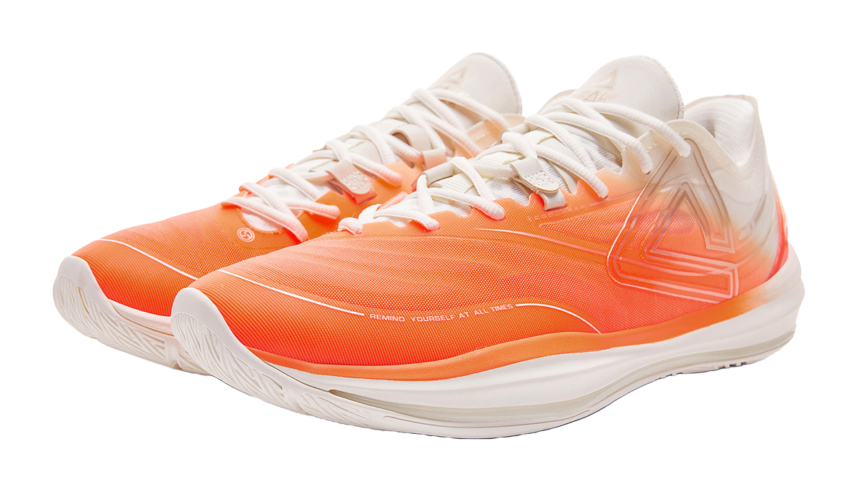 PEAK lightweight basketball shoes, fluorescent orange upper with white laces and cushioned midsole