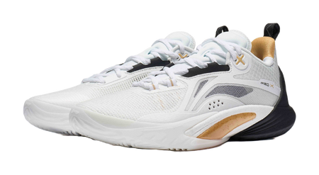 White and black basketball shoe with gold accent around collar, lace-up knit upper