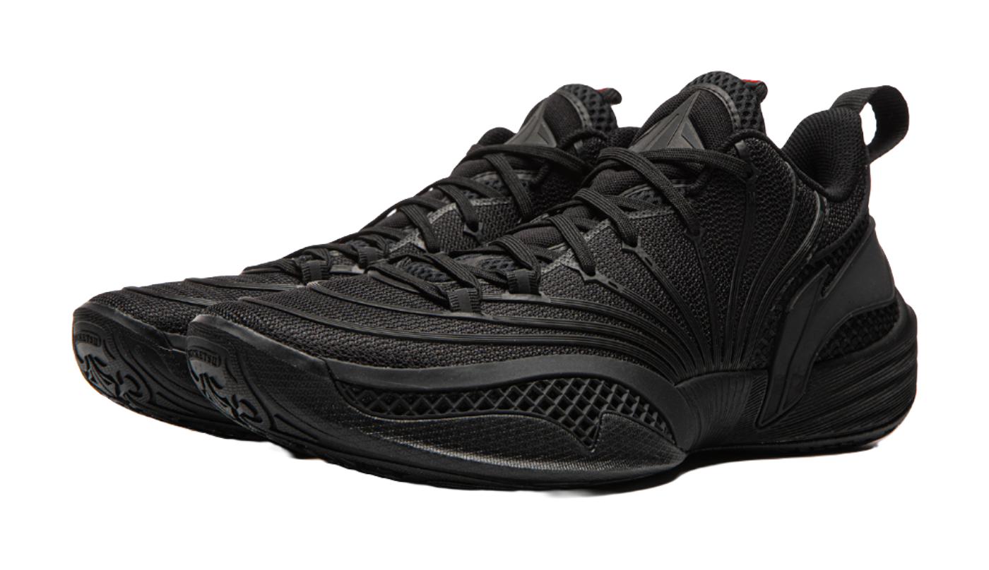 Black basketball shoe angled view with textured side panels and lace-up front