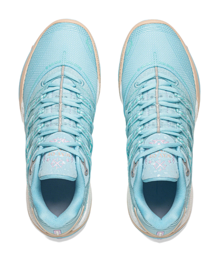 Pair of light blue low basketball shoes shown from front with lace-up closure