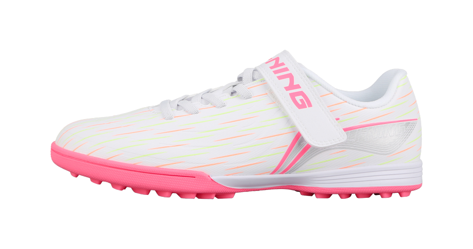 Pink and white youth turf soccer training shoe with hook-and-loop strap, side view