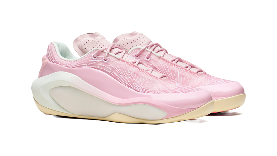 Men's bubble gum pink basketball shoe, angled side view with perforated upper