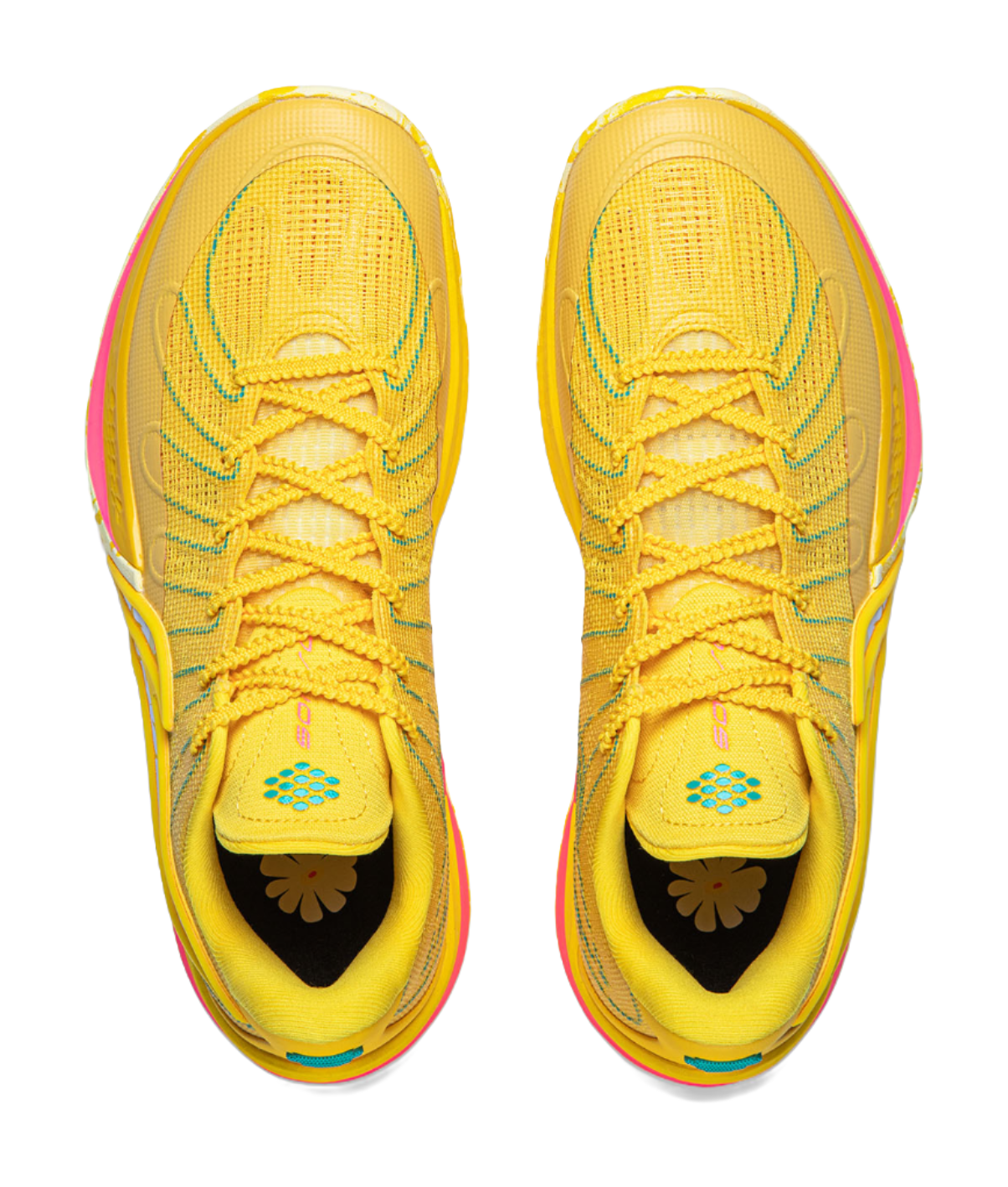 Pair of lemon yellow lace-up basketball shoes with cushioned tongue and flower heel graphic