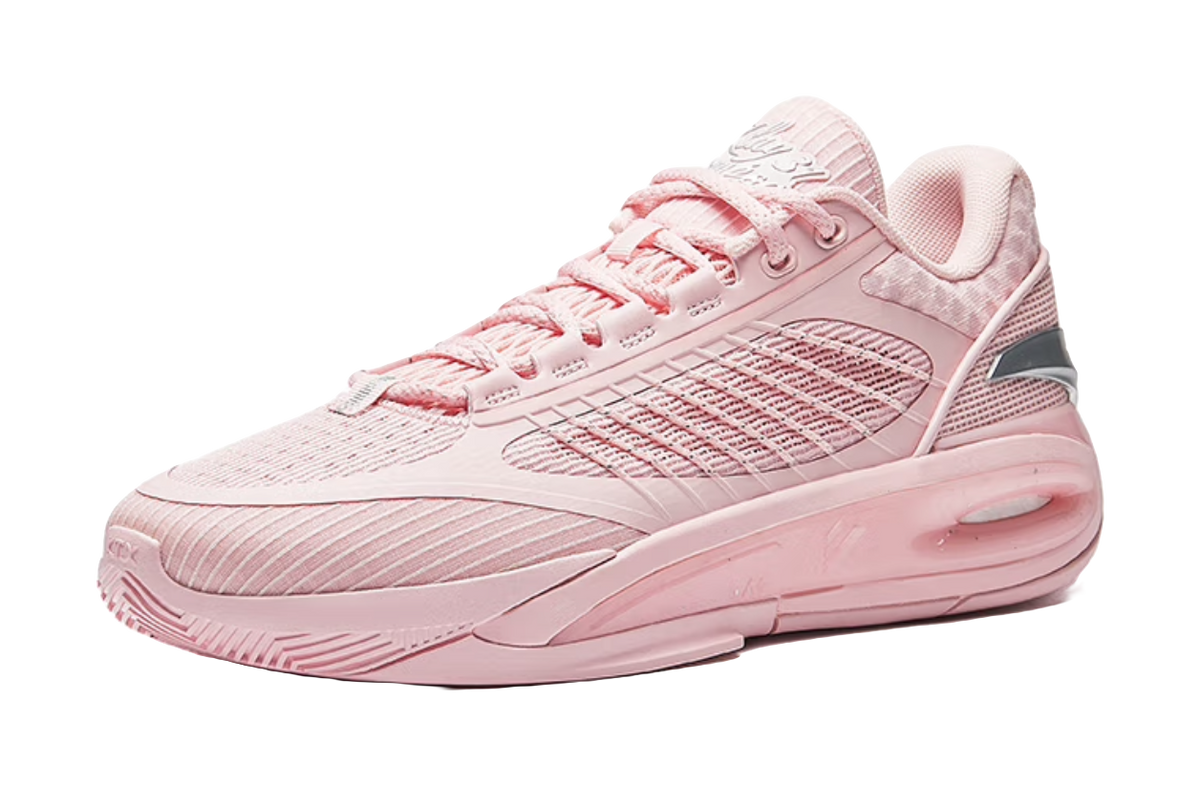Light pink lace-up basketball shoe with overlay panel and cushioned sole