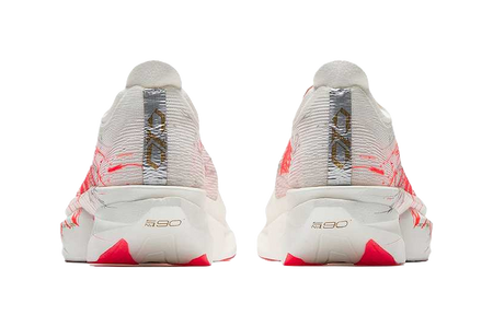 Women’s low-top running shoe heels, white knit with red streak accents and cushioned back