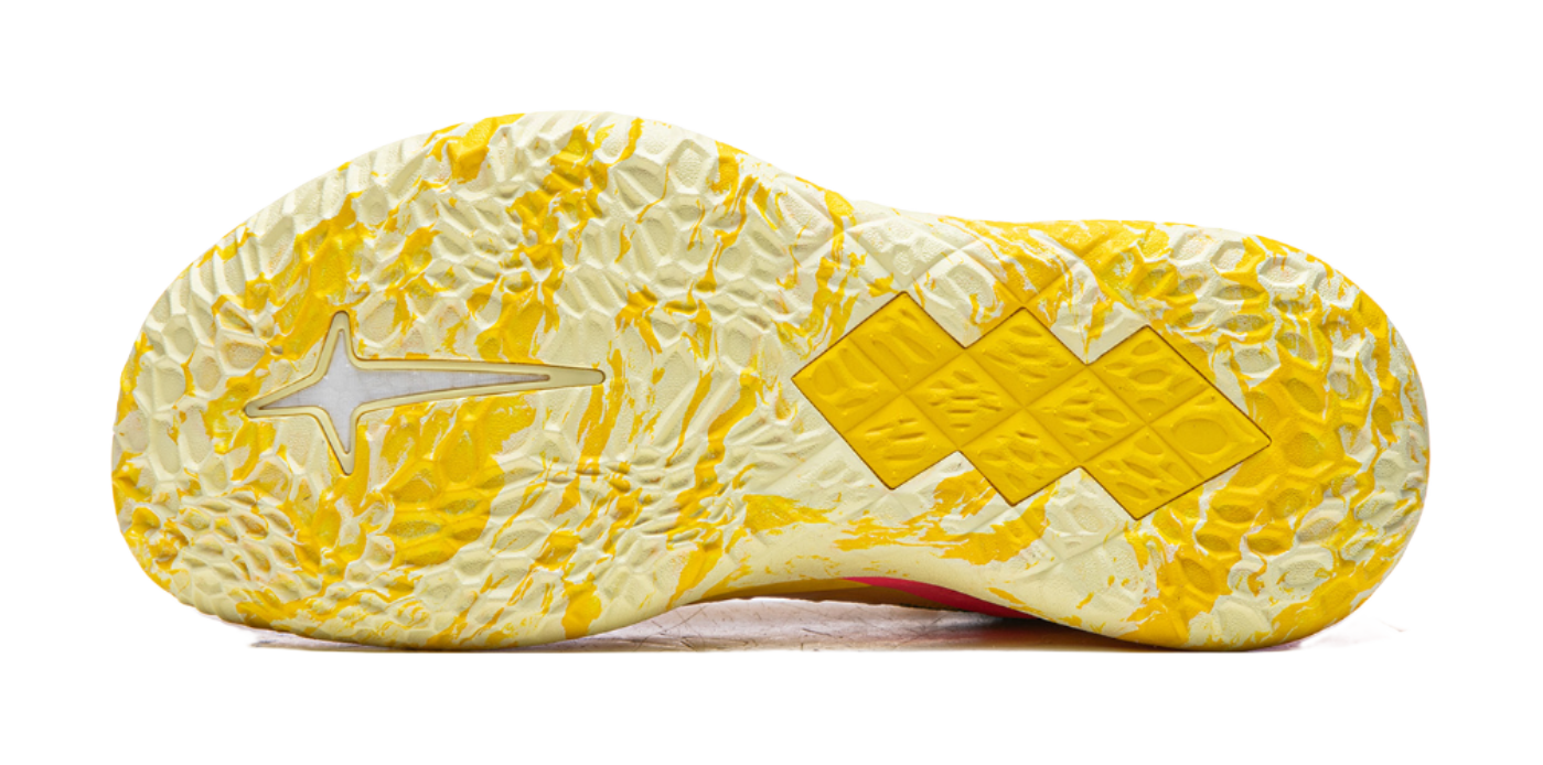 Lemon yellow basketball shoe outsole with textured tread and star-pattern traction pods