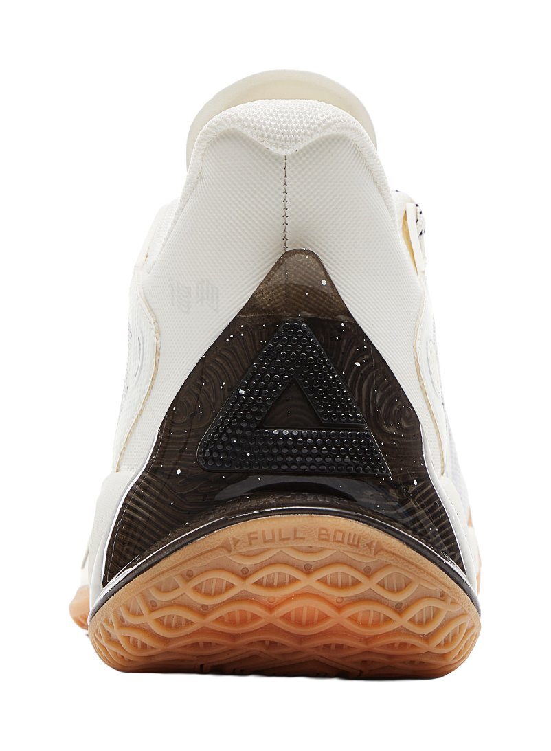 White basketball shoe heel with dark inset panel and gum traction outsole