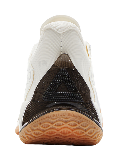White basketball shoe heel with dark inset panel and gum traction outsole