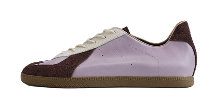 Lavender low-top training shoes with dark brown side panels, white laces, gum sole
