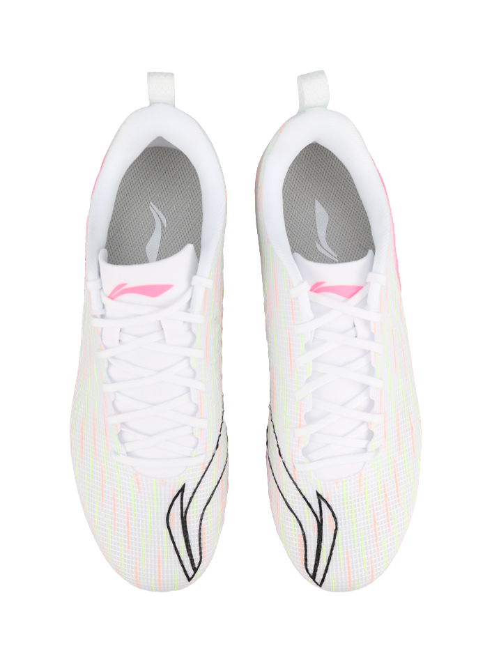 Pair of youth soccer shoes with white laces, multicolor grid uppers, pink trim