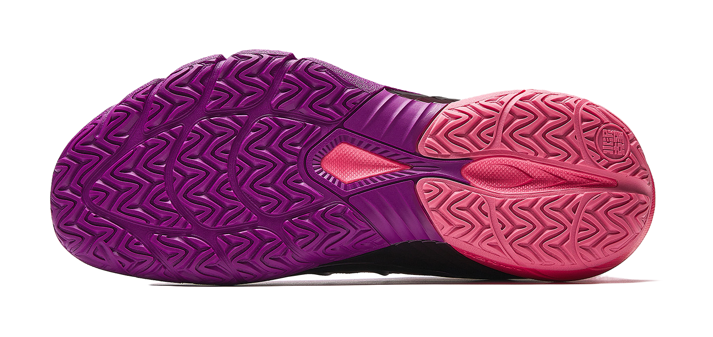 Low-top basketball shoes outsole view; purple tread with pink forefoot and heel.