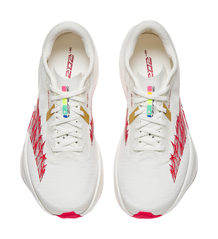 Pair of white lace-up running shoes with red dragon print and padded tongues