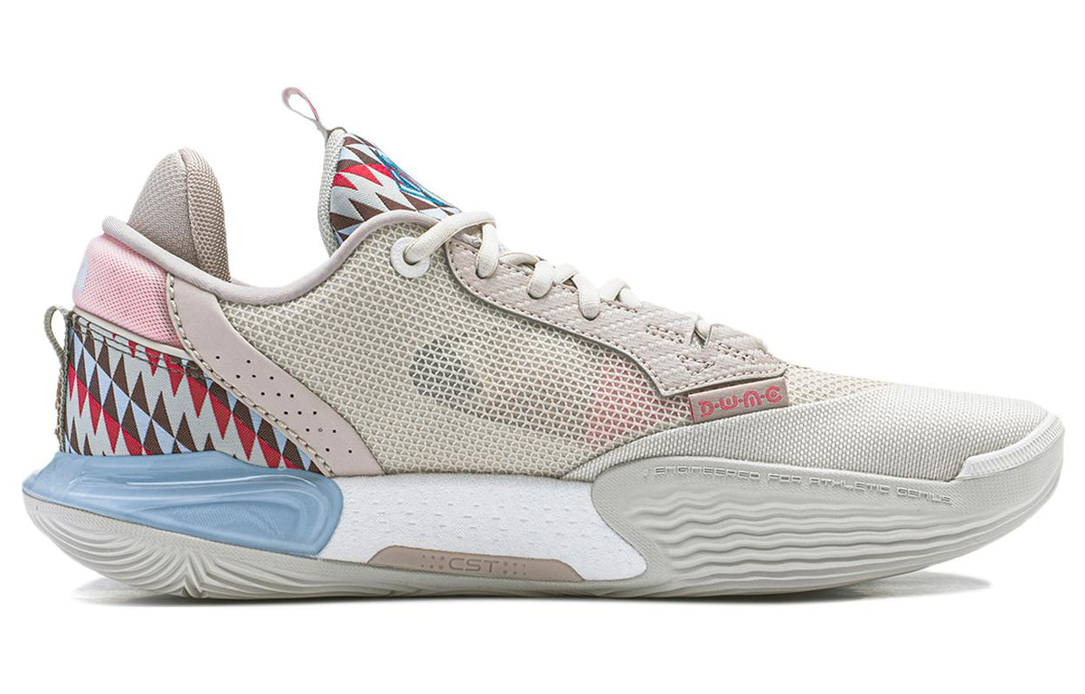 Beige basketball shoes with geometric trim, lace-up mesh upper, and light-blue outsole.