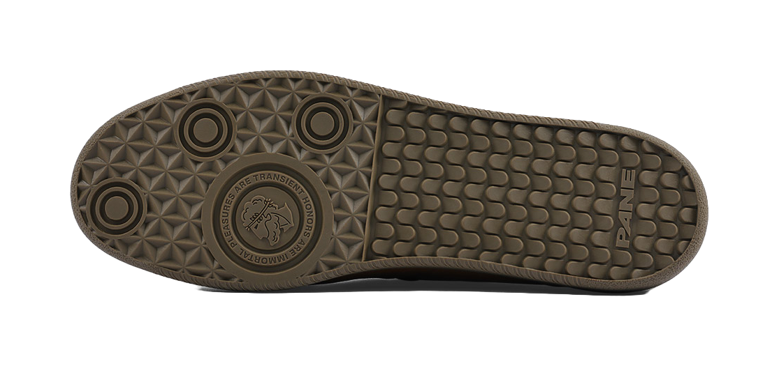 Gum rubber outsole with textured tread for low-top training shoes