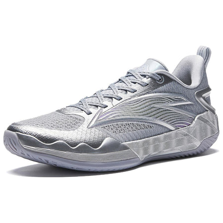 Men's basketball shoe in silver-gray, side view with molded lines and cushioned sole