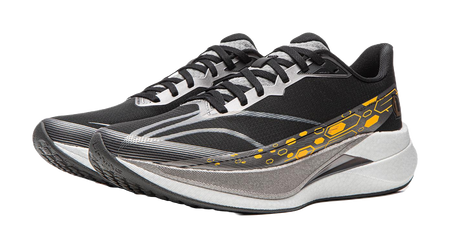 Black running shoe with textured gray panels, white-gray sole and yellow-orange stripe.