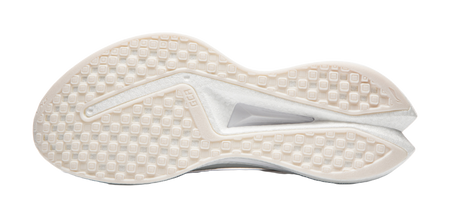 White shoe outsole with patterned traction tread and molded heel cup