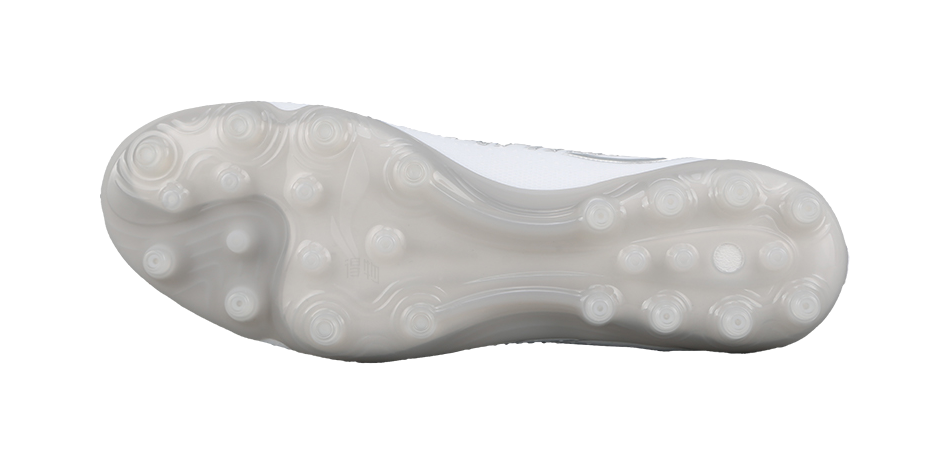 White silvery soccer cleat outsole with round molded traction studs.