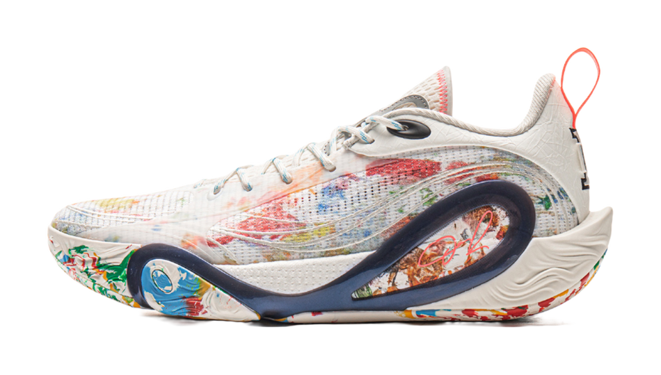 White basketball shoe with multicolor speckled knit upper and navy side panel