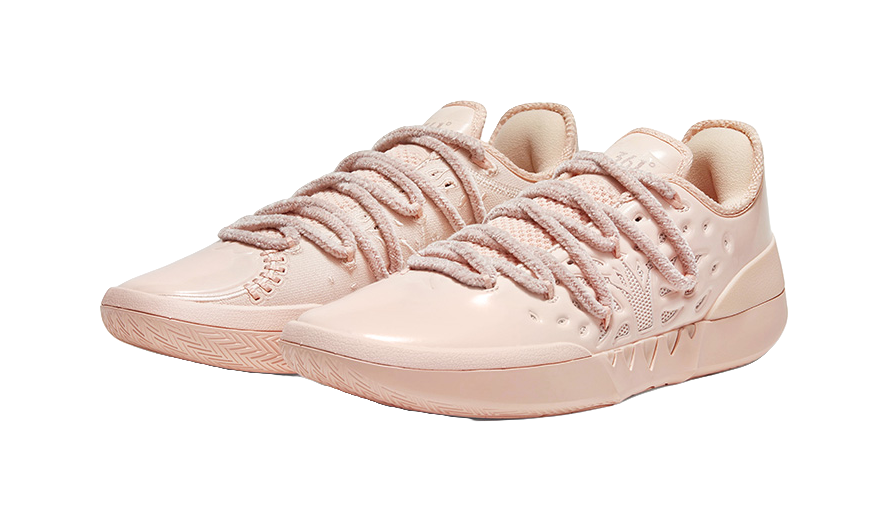 Soft pink low basketball shoes, lace-up with stitched sidewall logo detail