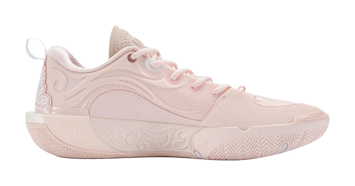 Light pink lace-up basketball shoe with high collar and patterned rubber outsole