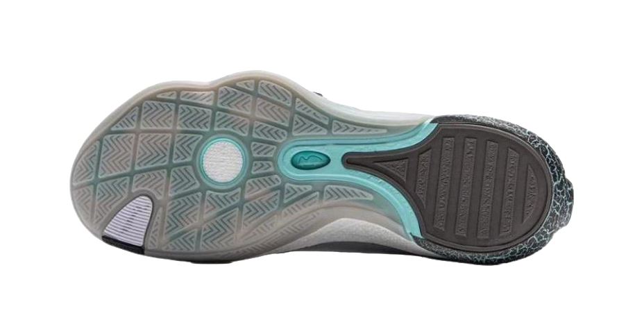Gray blue basketball shoe outsole with teal traction pattern and gray rubber