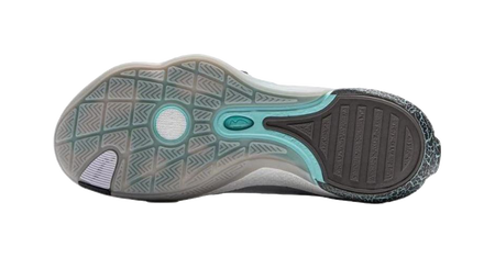 Gray blue basketball shoe outsole with teal traction pattern and gray rubber